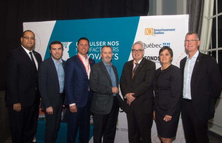 Dans l'ordre habituel: les députés Saul Polo et Jean Habel, Louis Leclair et Christian Élie, respectivement président de Les Fourgons Transit et Pélican International, Marc Langlois, directeur régional d’Investissement Québec, Chantal Provost, PDG de la Chambre de commerce et d'industrie de Laval, et Pierre Gabriel Côté, PDG d'Investissement Québec.