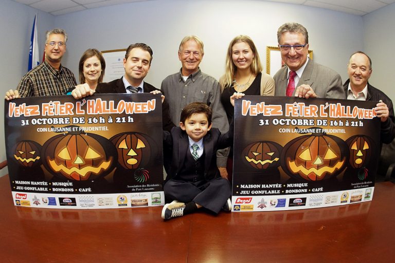 Francisco Callaci, Julie Landreville, du bureau du député de Vimont, Sebastien Sperano, de Remax, un commanditaire, Normand Cusson, de l'Association, Melissa Callaci, du bureau du député, Jean Rousselle, Denis Lapointe, de l'organisme vimontois, et le petit Gabriel Sperano invitent la population au parc de Lausanne.