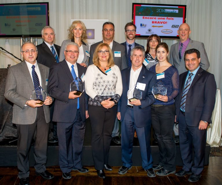 Les lauréats MercadOr 2014 en présence du président du conseil d’administration de Laval Technopole, David De Cotis, du directeur par intérim du Centre des affaires internationales de Laval Technopole, Bruno Séguin, et des représentants d'Emploi-Québec (EQ), Exportation et développement Canada (EDC), Investissement Québec (IQ) et du ministère de l’Économie, de l’Innovation et des Exportations du Québec (MÉIEQ), tous partenaires du concours.